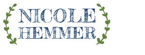  small logo - name Nicole Hemmer in uppercase text with vines on either side